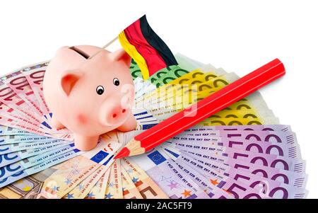Euro con il salvadanaio e bandiera tedesca Foto Stock