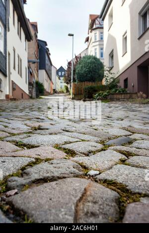 In salita ripida strade in acciottolato a Eisenach Foto Stock