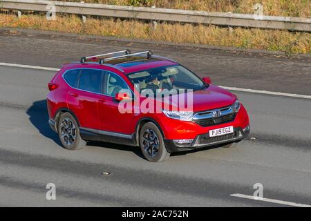 2019 rosso Honda CR-V EX I-Mmd CVT; traffico veicolare, trasporti, veicoli moderni, carrozze salone, sud-bound motoring sulla M61, Regno Unito Foto Stock