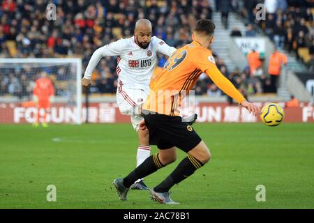 Wolverhampton, Regno Unito. 01 Dic, 2019. David McGoldrick di Sheffield Regno prende un colpo all'obiettivo. Premier league, Wolverhampton Wanderers v Sheffield Utd a Molineux Stadium di Wolverhampton domenica 1 dicembre 2019. Questa immagine può essere utilizzata solo per scopi editoriali. Solo uso editoriale, è richiesta una licenza per uso commerciale. Nessun uso in scommesse, giochi o un singolo giocatore/club/league pubblicazioni. pic da Steffan Bowen/Andrew Orchard fotografia sportiva/Alamy Live news Credito: Andrew Orchard fotografia sportiva/Alamy Live News Foto Stock