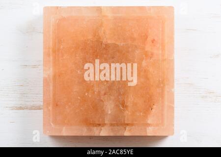 Square Hymalayan rosa blocco di sale con crepe vista superiore Foto Stock