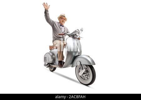 Uomo anziano in sella a una moto-scooter attraverso Alicante città vecchia  Foto stock - Alamy