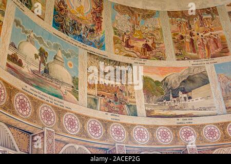 Sri Lanka Colombo - Agosto 2015: pareti dipinte di raccontare storie in Sambodhi Chaithya stupa. Foto Stock