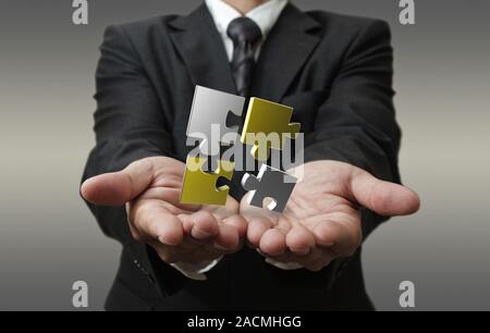 3d puzzle metallico come concetto Foto Stock
