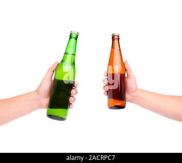 Due bottiglie di birra e le mani Foto Stock