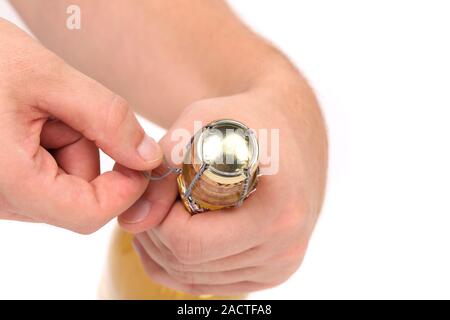 Lato di apertura della bottiglia di champagne Foto Stock