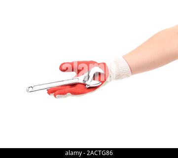 Mano nel guanto offre la chiave. Foto Stock
