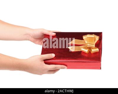 Mano trattiene confezione regalo Foto Stock