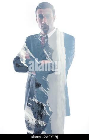 Doppia esposizione di Business uomo isolato su sfondo bianco Foto Stock