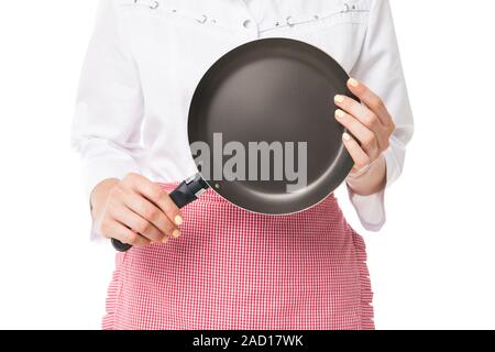 Donna che mantiene padella Foto Stock