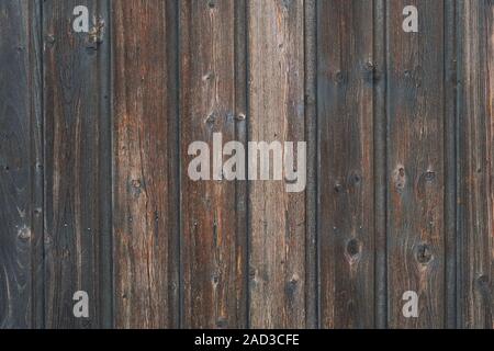 Vecchio weathered angosciate di legno marrone scuro e legno di imbarco sfondo texture Foto Stock
