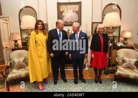 Il Principe di Galles e la duchessa di Cornovaglia incontra il presidente statunitense Donald Trump e la moglie Melania al Clarence House, Londra centrale, come i leader della NATO si riuniscono per contrassegnare 70 anni di alleanza. Foto Stock