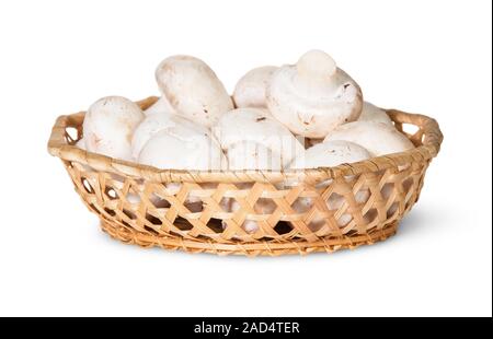 Funghi champignon in un cesto di vimini Foto Stock