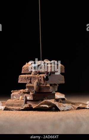 Il cioccolato al latte spruzzato con sciroppo Foto Stock