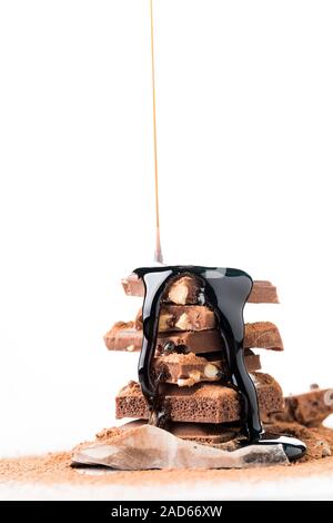 Porosi, cioccolato con noci, topping Foto Stock