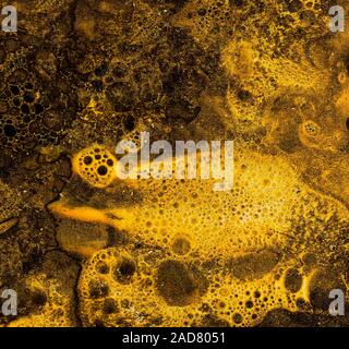 Oro liquido sfondo grunge Foto Stock