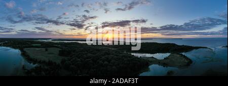 Tramonto lungo la spiaggia al punto Towd in Southampton, Long Island, New York. Foto Stock