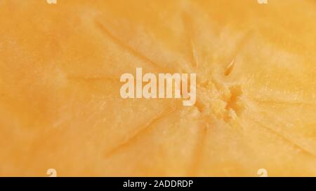 Il nucleo di ripe soft succosa persimmon close-up. Sfondo. Copyspace. Rendere nutrienti a base di frutta pasti dietetici Foto Stock