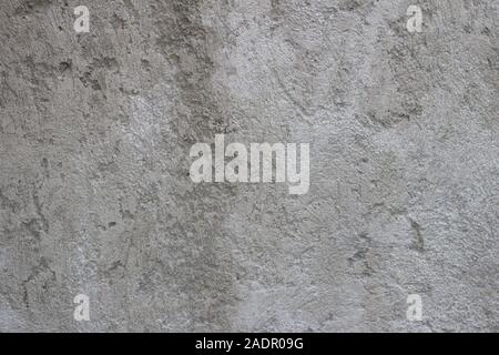 Vecchio muro di cemento grigio testurizzato Foto Stock