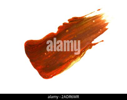 Macchie e texture di bronzo lip gloss isolati su sfondo bianco Foto Stock