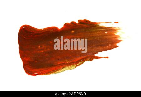 Macchie e texture di bronzo lip gloss isolati su sfondo bianco Foto Stock