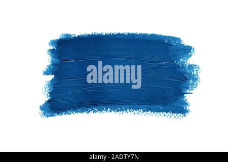 Closeup Cospargere di vernice blu isolato su sfondo bianco. Foto Stock