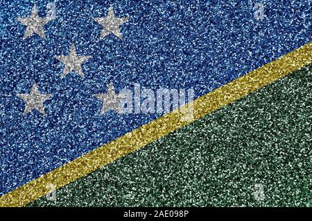 Isole Salomone bandiera raffigurata su molti piccoli shiny paillettes. Festival colorati sfondo per discoteca party Foto Stock