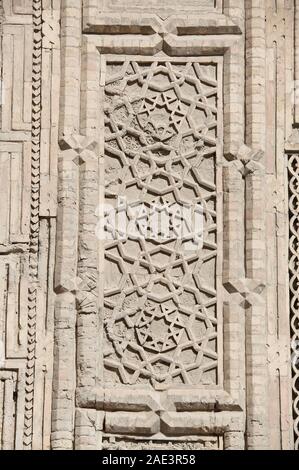 Dettagli architettonici della facciata a sud di antiche Magok-ho Attari moschea di Bukhara Foto Stock