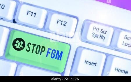 La grafia la scrittura di testo Stop fgm. Foto concettuale di porre fine o di arresto sul taglio genitale e la circoncisione Foto Stock