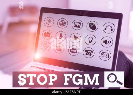 La scrittura della nota mostra Stop fgm. Il concetto di business per porre fine o stop sul taglio genitale e la circoncisione Foto Stock