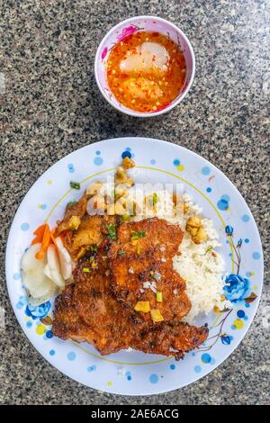 Il vietnamita in casa la carne di maiale tritare il riso- Com Tam Foto Stock