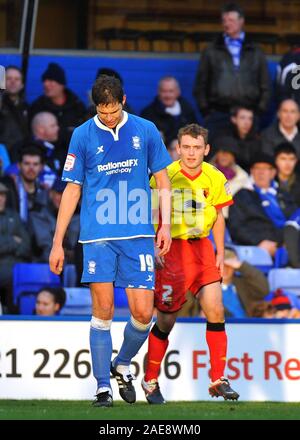 Il 21 gennaio 2012. npower campionato di calcio - Birmingham City Vs Watford. Il sole invernali Highlights Nikola Zigic della città di Birmingham e Lee Hodson di Watford. Fotografo: Paolo Roberts/OneUpTop/Alamy. Foto Stock