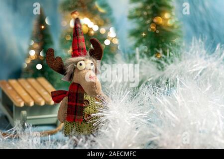 Renne giocattolo con festa di Natale sfondo per le vacanze Foto Stock