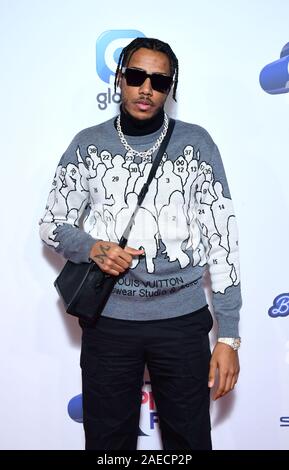 AJ Tracey durante l'esecuzione media al giorno due di capitale il Jingle Bell Ball con sede a Londra la O2 Arena. Foto Stock