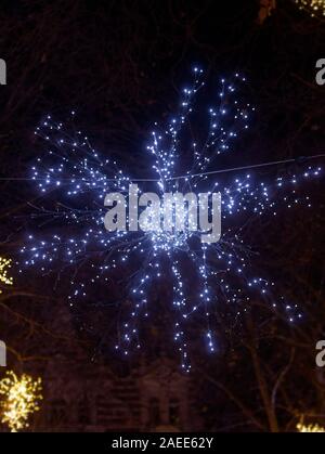 Close-up di luci di Natale a Sloan Square. Foto Stock