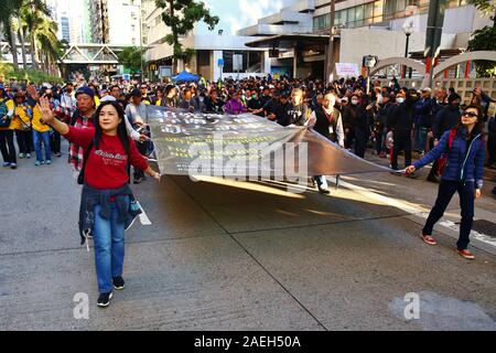 Hong Kong, Cina. 8th, dicembre 2019. Centinaia di migliaia di pro-democrazia pacificamente frequentare la Giornata dei Diritti Umani marzo da Victoria Park a Causeway Bay per carta Road presso la centrale. Foto Stock