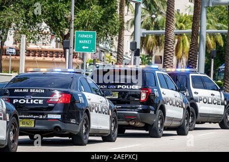 Miami Beach Florida,Normandia Isle,polizia,forze dell'ordine,auto,SUV,veicoli,luci lampeggianti blu rosse,FL191025001 Foto Stock