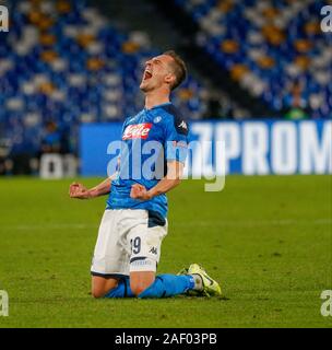 Napoli, campania, Italy. Decimo Dec, 2019. ARKADIUSZ MILIK celebra durante la Champions League Football Match SSC Napoli vs FC Genk alla stadio San Paolo. Credito: Fabio Sasso/ZUMA filo/Alamy Live News Foto Stock