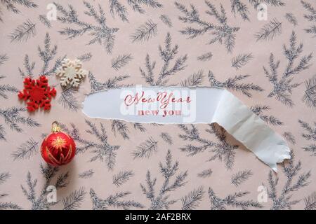 "Nuovo anno nuovo voi" sullo sfondo della carta di imballaggio di Natale. Natale vendita sfondo, carta da parati, volantini, invito, poster, brochure, banner. Foto Stock