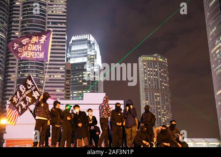 Hong Kong 12 dicembre 2019. Anti contestatori del governo di tenere un rally titolato United We Stand per contrassegnare 6 mesi dal lancio di gas lacrimogeni in primo luogo è stato licenziato il 12 giugno 2019. Tenuto nel centro di Hong Kong. Credito: David Coulson/Alamy Live News Foto Stock