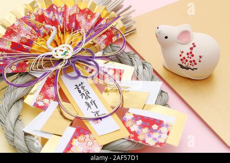 Bambole di Nezumi Mouse. Giapponese anno nuova scheda. Giapponese anno nuovo oggetto del Mouse. Parola giapponese di questa fotografia significa "celebrazione e nuovo anno' Foto Stock