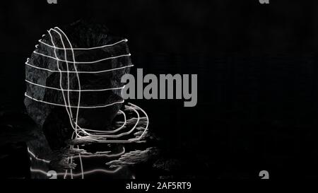 Un LED bianco nastro viene avvolto intorno a un grande blocco di pietra. Sfondo nero e il pavimento con la riflessione. 3D illustrazione Foto Stock