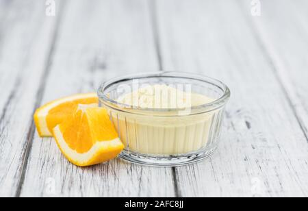 Porzione di fresche fatte polvere arancio come dettagliato di close-up shot (messa a fuoco selettiva) Foto Stock