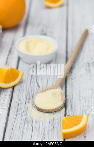 Porzione di fresche fatte polvere arancio come dettagliato di close-up shot (messa a fuoco selettiva) Foto Stock