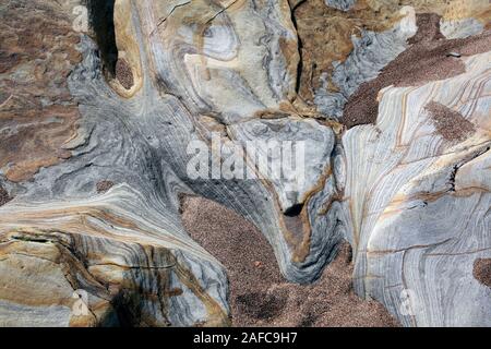 In prossimità delle rocce e sabbia sulla spiaggia di Spittal, vicino a Berwick-upon-Tweed, Northumberland. Foto Stock
