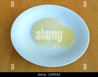 Il Miele nella piastra Foto Stock