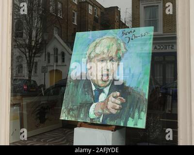 Londra, Regno Unito. Xvi Dec, 2019. Una galleria di Chelsea è mettere un ritratto di Boris Johnson centrale e anteriore della sua finestra per festeggiare la vittoria di Johnson. Dipinto da un artista Gow, quando Johnson è stato il sindaco di Londra e firmato da Johnson stesso, ha un prezzo di partenza di £ 6000.La galleria ha anche un secondo Gow di Johnson a un prezzo simile. Credito: Brian Minkoff/Alamy Live News Foto Stock