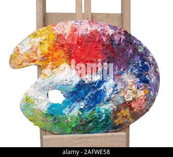 Vari colori a olio su legno colorato pittore del pallet Foto Stock