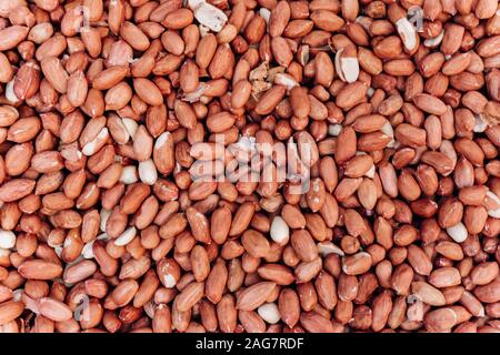 Primo piano immagine di arachidi salate come alimento in background Foto Stock