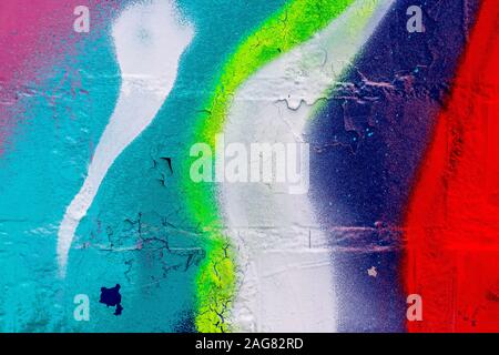Frammento di graffiti colorati dipinta su un muro di mattoni. Texture. Sfondo astratti per la progettazione. Foto Stock